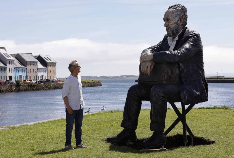 Sean Henry with his Seated Man sculpture at Galway International Arts Festival. (Picture: Mark Stedman)