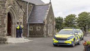 <p>Gardai at the scene of the knife attack at the Holy Cross Catholic Church, Tramore, Co Waterford. Picture: Patrick Browne</p>