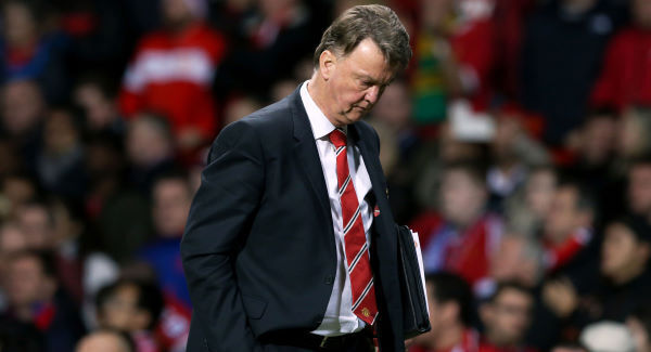 Manchester United manager Louis van Gaal leaves the touchline at half-time during the Barclays Premier League match at Old Trafford.