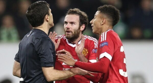 Juan Mata, centre, and Jesse Lingard discusses with referee Milorad Mazic after a goal was disallowed. Photo: Michael Sohn/AP Juan Mata, centre, and Jesse Lingard discusses with referee Milorad Mazic after a goal was disallowed. Photo: Michael Sohn/AP