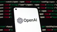 OpenAI logo displayed on a smartphone screen, With code background depicting artificial intelligence. Indonesia - May 27, 2025