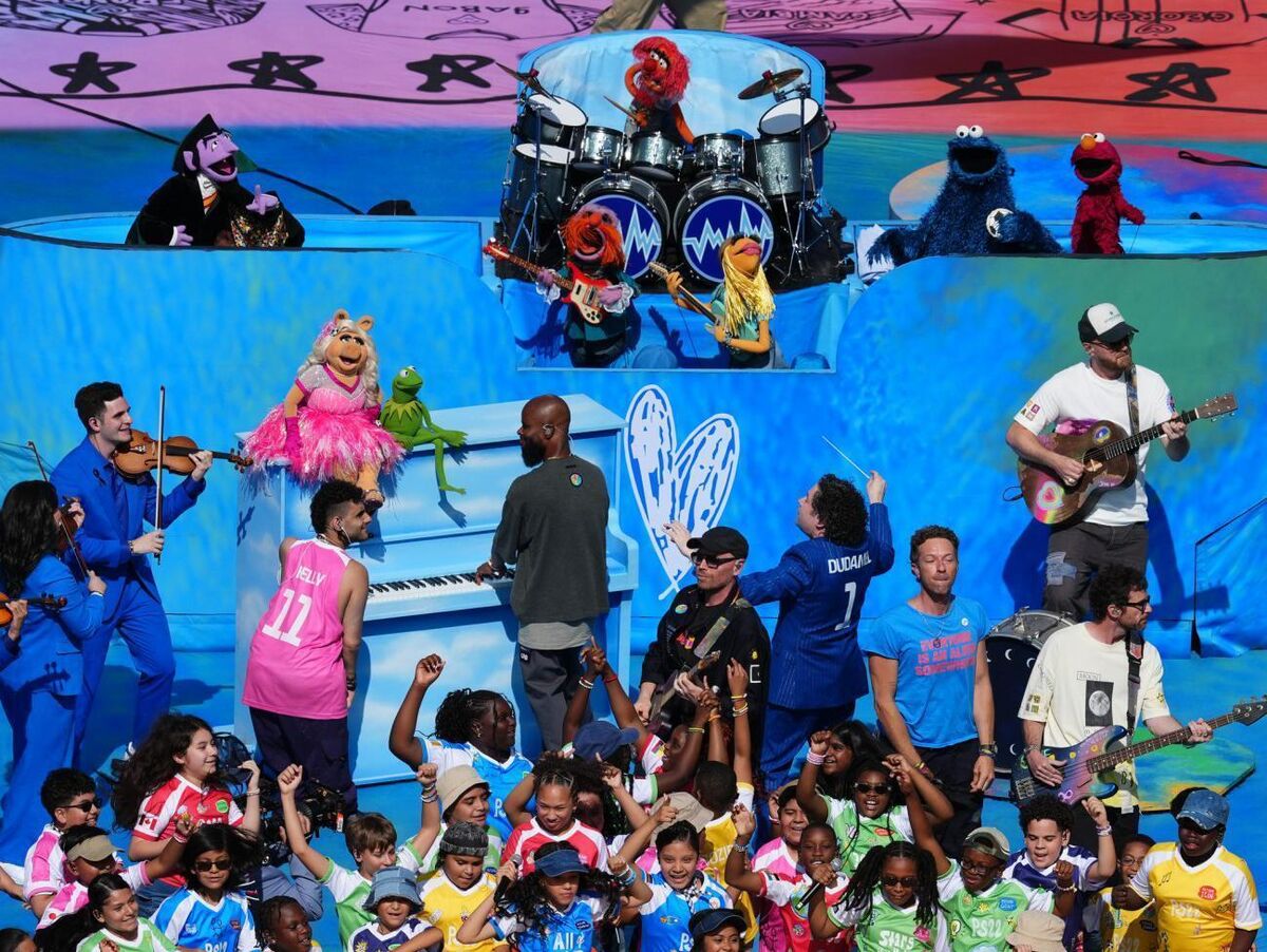 Chris Martin (lower right) with some Muppets and other participants in the World Cup half-time show. Picture: Martin Rickett/PA Chris Martin (lower right) with some Muppets and other participants in the World Cup half-time show. Picture: Martin Rickett/PA
