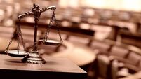 Symbol of law and justice in the empty courtroom