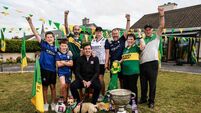 David Moran alongside Joe Wallace, Ruth Wallace, Marie Wallace, Jason Wallace, Niall Hourigan, Dara McCarthy, Micheal McCarthy a