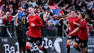 <p>HI-HO, IT'S OFF TO KOSOVO: Bohemians' Ross Tierney celebrates after scoring his side's winner. Pic: Stephen McCarthy/Sportsfile.</p>
