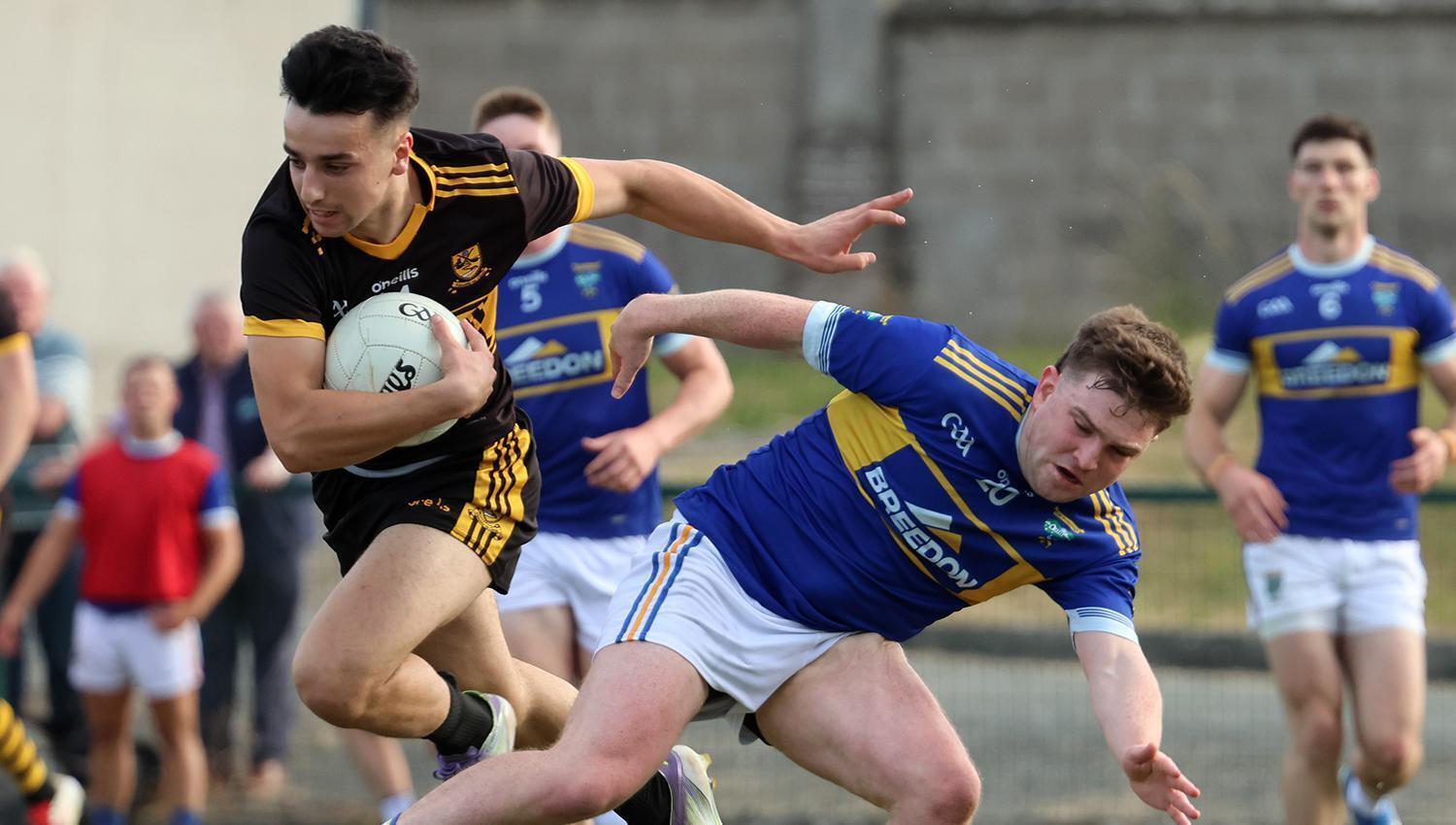DERBY DRAMA: Cian Walsh, Clyda Rovers clashing with Conor Murphy, Kilshannig in the SAFC. Pic: Brendan Gleeson.
