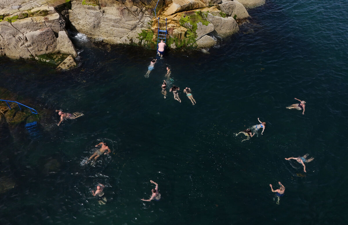 People cooling off at the Forty Foot bathing place at Sandycove in Dublin. A "heat-dome" settling over western Europe has brought extreme conditions across the continent. Picture date: Wednesday June 24, 2026. People cooling off at the Forty Foot bathing place at Sandycove in Dublin. A "heat-dome" settling over western Europe has brought extreme conditions across the continent. Picture date: Wednesday June 24, 2026.