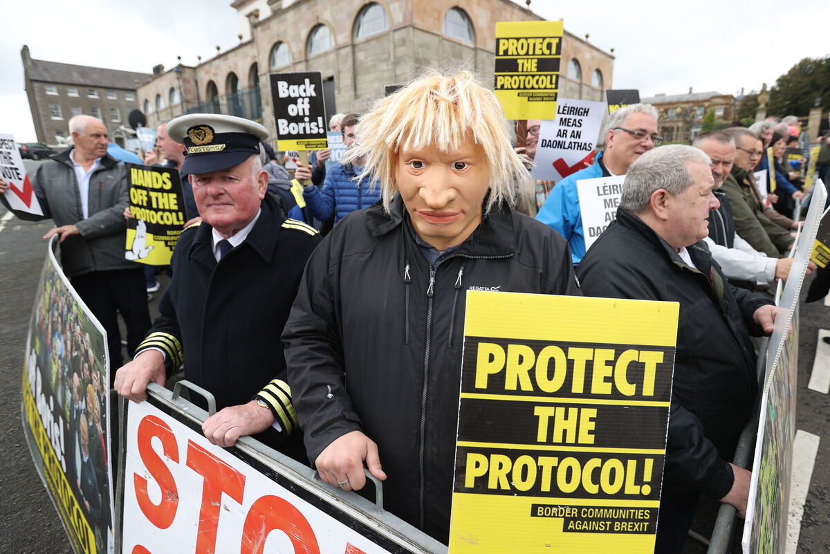 A man dressed as a customs officer and another dressed as Boris Johnson with protesters from Border Communities Against Brexit outside Hillsborough Castle in 2022 Picture: Liam McBurney/PA A man dressed as a customs officer and another dressed as Boris Johnson with protesters from Border Communities Against Brexit outside Hillsborough Castle in 2022 Picture: Liam McBurney/PA