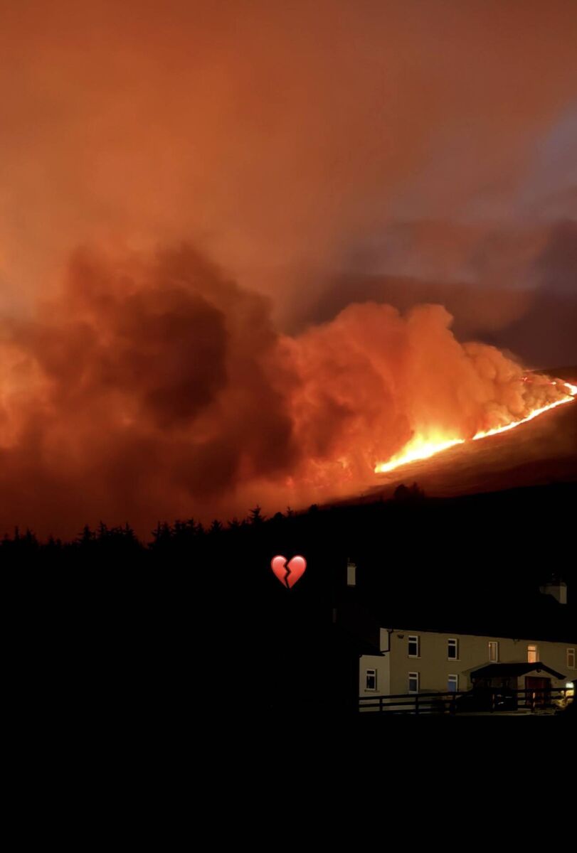 Flames and plumes of smoke from the wildfires on Slievenamon. Picture: Roz Purcell/Instagram Flames and plumes of smoke from the wildfires on Slievenamon. Picture: Roz Purcell/Instagram