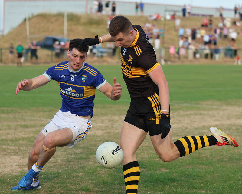 Conor Corbett, Clyda Rovers in possession against Colm O'Shea, Kilshannig in the SAFC Conor Corbett, Clyda Rovers in possession against Colm O'Shea, Kilshannig in the SAFC