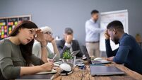 Businesspeople Getting Bored In Office
