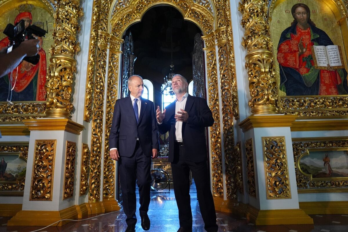 Micheal Martin with Maksym Ostapenko inspecting damage inside Kyiv’s Dormition Cathedral. Picture: Niall Carson/PA Micheal Martin with Maksym Ostapenko inspecting damage inside Kyiv’s Dormition Cathedral. Picture: Niall Carson/PA