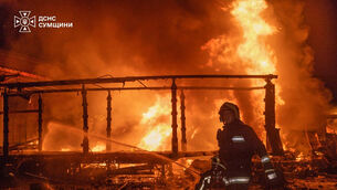 Firefighters put out a fire following a Russian air attack in Sumy (Ukrainian Emergency Service/AP) Firefighters put out a fire following a Russian air attack in Sumy (Ukrainian Emergency Service/AP)