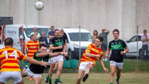 <p>Nemo Rangers’ Barry Cripps dives to block a strike by Newcestown’s Humphrey Canty. Picture: Chani Anderson</p> <p>Nemo Rangers’ Barry Cripps dives to block a strike by Newcestown’s Humphrey Canty. Picture: Chani Anderson</p>