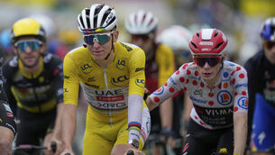 <p>Tadej Pogacar will start Sunday’s shortened stage into Paris leading the Tour de France by six minutes and 26 seconds. Pic: AP Photo/Mosa'ab Elshamy</p> <p>Tadej Pogacar will start Sunday’s shortened stage into Paris leading the Tour de France by six minutes and 26 seconds. Pic: AP Photo/Mosa'ab Elshamy</p>