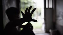 Child abuse concept, silhouette of  child confined in a dark room, prisoner or child abduction, child abuse human trafficking.