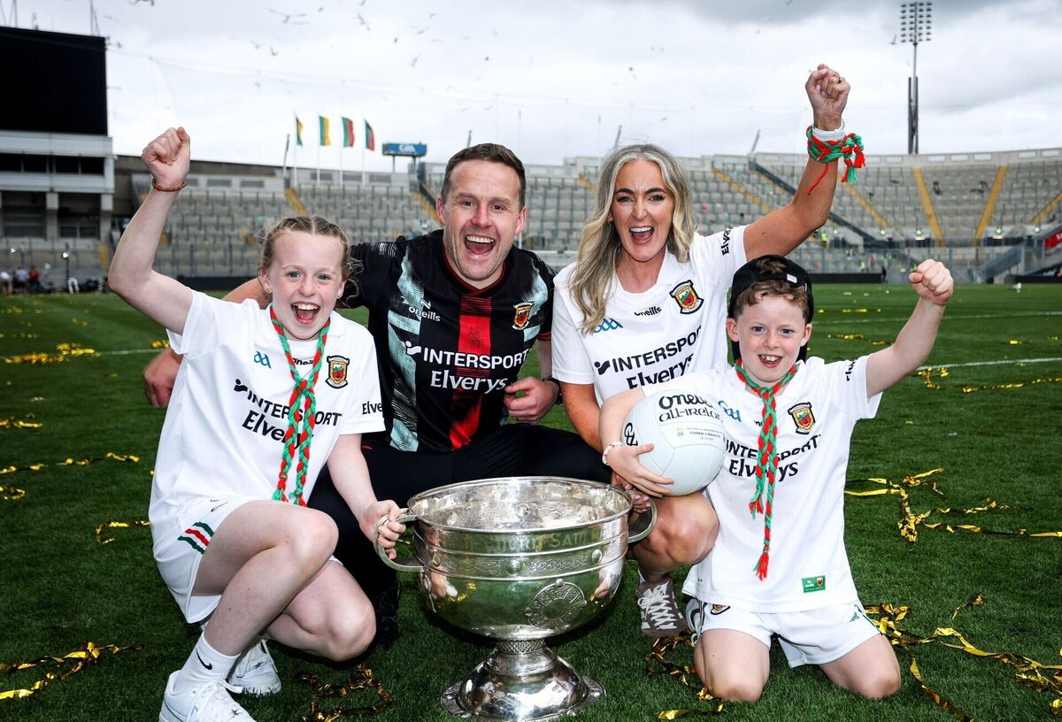 Mayo manager Andy Moran and his wife Jennifer, daughter Charlotte and son Ollie celebrate with the Sam Maguire Cup. Pic: Mandatory Credit ©INPHO/Tom Maher