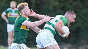 <p> Valley Rovers' William Hurley battles past St Michael's Eoin Hickey during their Premier SFC clash at Shanbally. Picture: David Keane.</p>