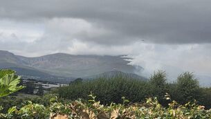 <p>Smoke was seen emanating from the Comeragh Mountains yesterday. Pic: Hello Stradbally FB </p>