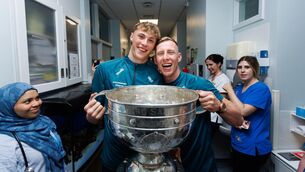 <p>Mayo's Kobe McDonald and Ryan O'Donoghue visit Temple Street Children's Hospital. Pic: ©INPHO/Tom Maher</p>