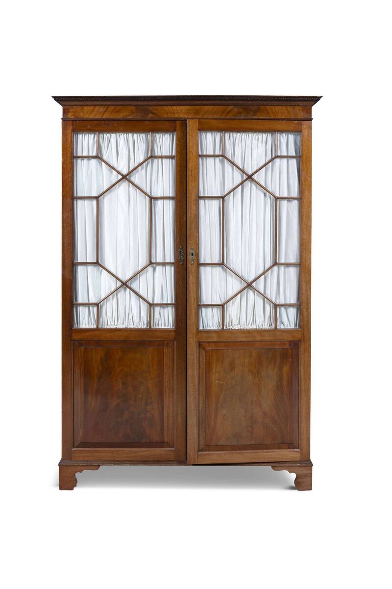 This Edwardian wardrobe with astragal glazed doors made €1,200 at hammer at James Adam. This Edwardian wardrobe with astragal glazed doors made €1,200 at hammer at James Adam.