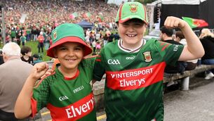 <p>Mayo supporters Elijah and Cillian enjoying the homecoming for the team and Sam Maguire trophy at Castlebar following Sunday's victory over Kerry in the GAA All-Ireland Senior Football Championship final at Croke Park. Picture: John Sheridan/Sportsfile</p>