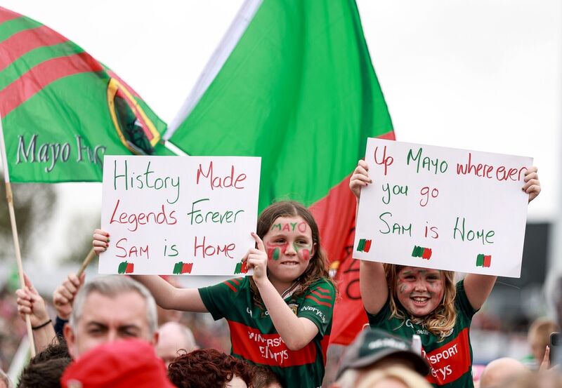 Young Mayo supporters enjoying the homecoming. Picture: James Crombie/Inpho