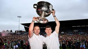 <p>Mayo manager Andy Moran, left, and Mayo captain Jack Coyne celebrate with the Sam Maguire Cup during the homecoming celebrations in Castlebar. Mayo's historic All-Ireland win saw a massive hike in mobile data usage, with networks reporting a surge in demand, including the largest ever increase in Irish roaming traffic.</p>