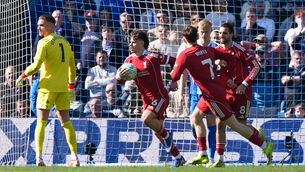 <p>Liverpool's Milos Kerkez (centre) celebrates.</p>