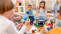 Preschool Children Playing Music Using Various Colorful  Instruments