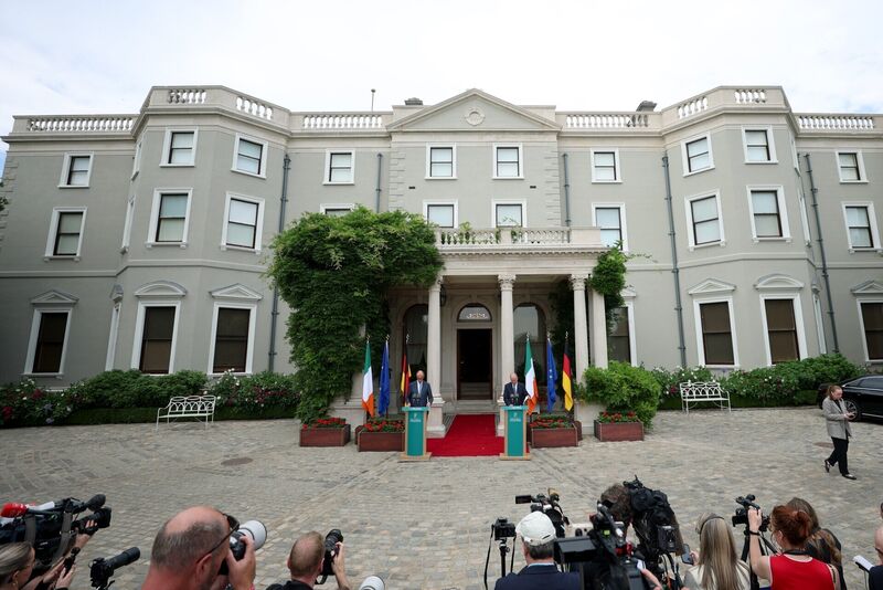 Members of the media outside Farmleigh House for the press conference by Taoiseach Micheál Martin and German chancellor Friedrich Merz. The headset issue resolved itself once their exchanges reverted from German to English and Irish. Picture: Liam McBurney/PA Members of the media outside Farmleigh House for the press conference by Taoiseach Micheál Martin and German chancellor Friedrich Merz. The headset issue resolved itself once their exchanges reverted from German to English and Irish. Picture: Liam McBurney/PA