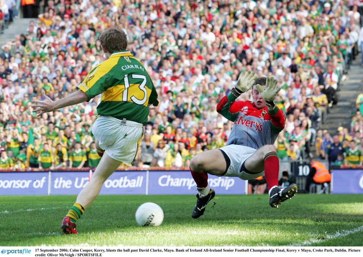 SLIPPING BY: Kerry's Colm Cooper dances inside the Mayo cover and, at the second attempt, plants the ball past mayo keeper David Clarke in the 2006 All-Ireland finasl. Pic: Oliver McVeigh., Sportsfile SLIPPING BY: Kerry's Colm Cooper dances inside the Mayo cover and, at the second attempt, plants the ball past mayo keeper David Clarke in the 2006 All-Ireland finasl. Pic: Oliver McVeigh., Sportsfile