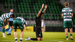 <p>Bruno Wilson of Ararat-Armenia celebrates at the final whistle. Pic: Sam Barnes/Sportsfile</p>