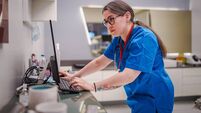 Healthcare Worker Scheduling Appointments in Clinic