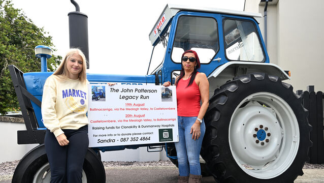 <p>Lily and Sandra Patterson beside the Ford 6600 tractor, previously owned by Sandra's father John Patterson. Pictures: Larry Cummins</p>
