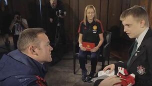 Watch the moment a young fan is surprised by his idol Wayne Rooney
