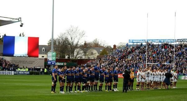 Players and officials line up for a minute’s silence over the terrorist attacks in Paris during the European Rugby Champions Cup match between Leinster Rugby and Wasps at the RDS today. Picture: Ian Walton/Getty Images