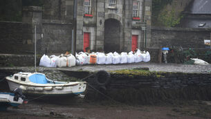 <p>Temporary flood protection measures at Bantry town, Co Cork, in 2021. Large sandbags in position beside Bantry Town Square to protect against flooding from the sea. Pic: Larry Cummins</p>