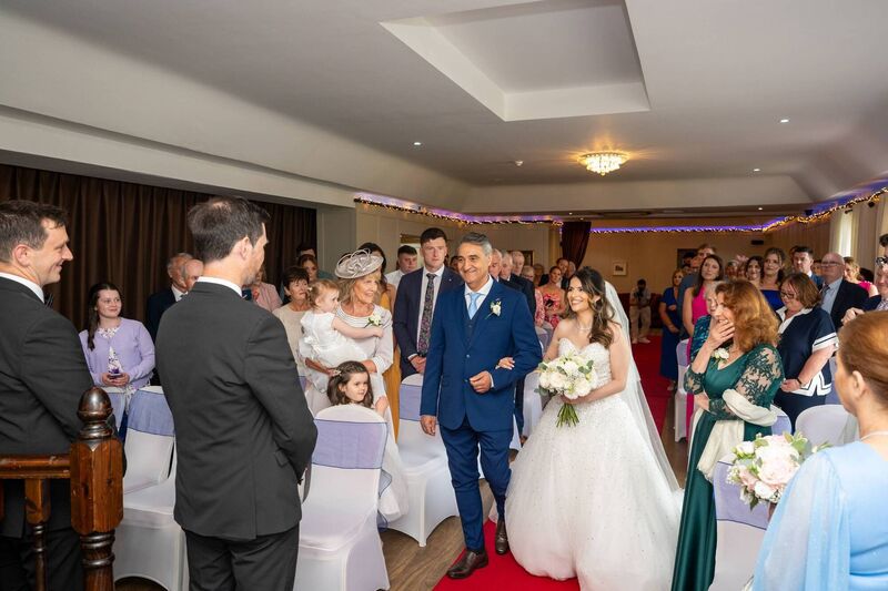 Fernanda Ferreira arrives on the arm of her dad Fernando for the wedding ceremony. Pictures: Conor Healy