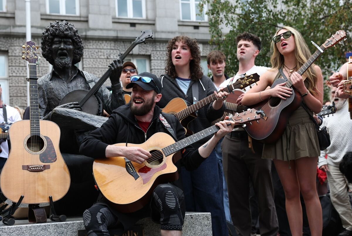 Musicians play in memory of Glen Hansard on King Street in Dublin. Picture: Damien Eagers/PA Wire Musicians play in memory of Glen Hansard on King Street in Dublin. Picture: Damien Eagers/PA Wire