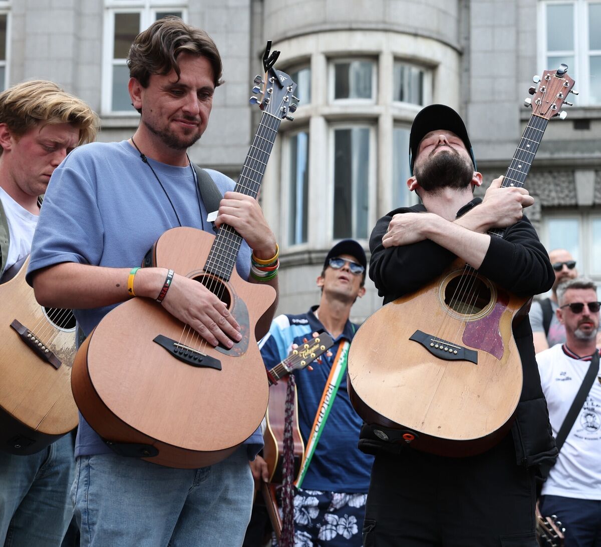 Musicians stand for a minute's silence in memory of Glen Hansard on King Street in Dublin. Picture: Damien Eagers/PA Wire Musicians stand for a minute's silence in memory of Glen Hansard on King Street in Dublin. Picture: Damien Eagers/PA Wire