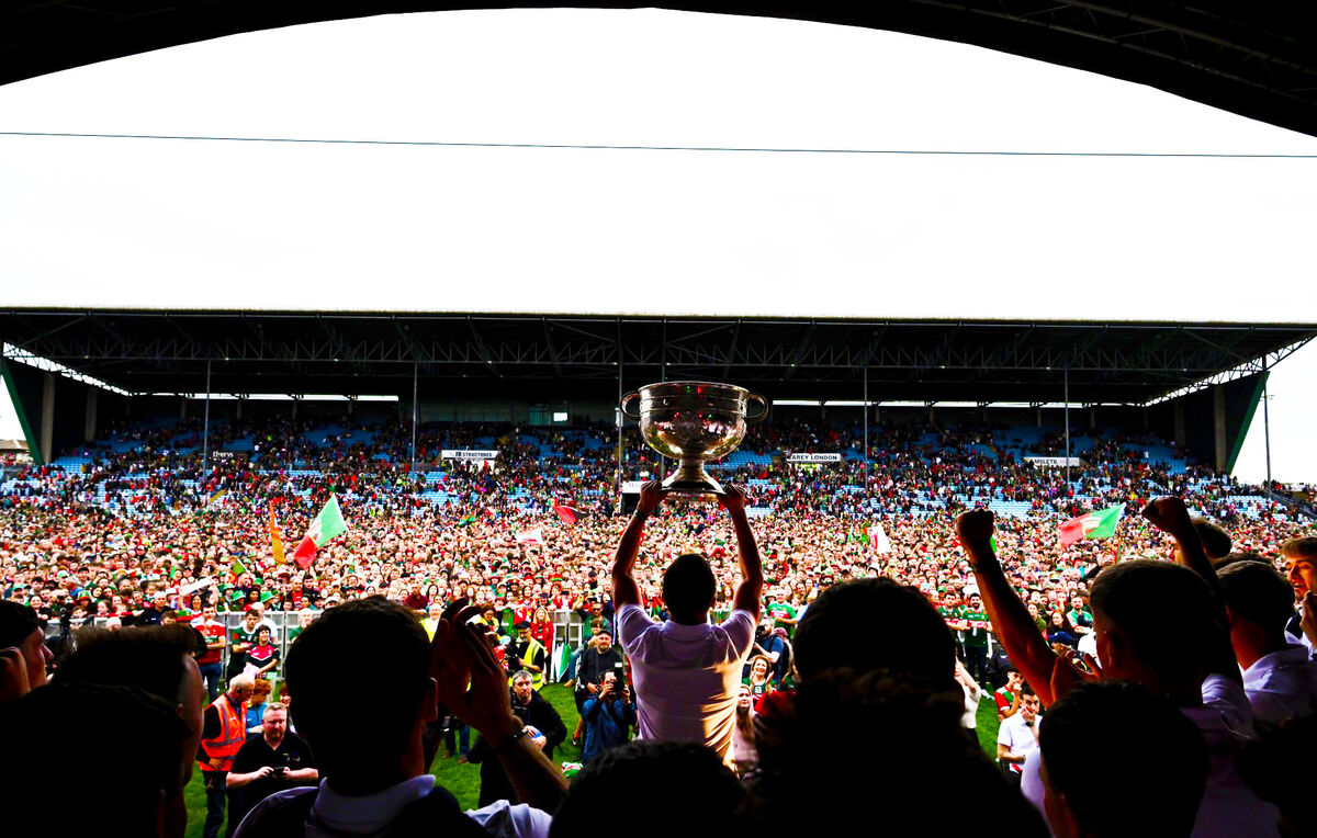 Mayo supporters celebrate as the Sam Maguire Cup is held aloft during the homecoming celebrations at MacHale Park on Monday. Picture: Piaras Ó Mídheach/Sportsfile Mayo supporters celebrate as the Sam Maguire Cup is held aloft during the homecoming celebrations at MacHale Park on Monday. Picture: Piaras Ó Mídheach/Sportsfile