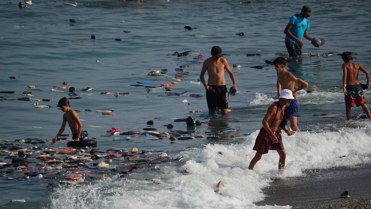 Spain to send military to Ceuta after nine die as thousands breach border