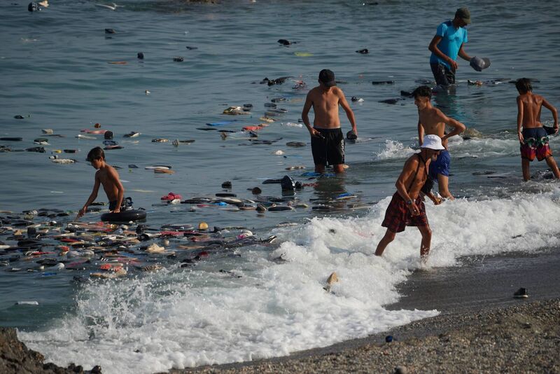 Belongings left behind by migrants float in the sea after they crossed from Morocco into the Spanish enclave of Ceuta, Thursday, July 30, 2026. (AP Photo/Antonio Sempere) Belongings left behind by migrants float in the sea after they crossed from Morocco into the Spanish enclave of Ceuta, Thursday, July 30, 2026. (AP Photo/Antonio Sempere)