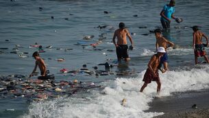 <p>Belongings left behind by migrants float in the sea after they crossed from Morocco into the Spanish enclave of Ceuta, Thursday, July 30, 2026. (AP Photo/Antonio Sempere)</p>