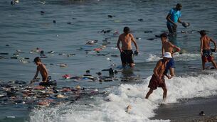 <p>Belongings left behind by migrants float in the sea after they crossed from Morocco into the Spanish enclave of Ceuta, Thursday, July 30, 2026. (AP Photo/Antonio Sempere)</p>
