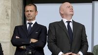 Aleksander Ceferin and Gianni Infantino file photo