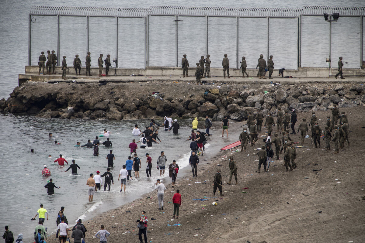 Spanish Army take positions as people from Morocco arrive in the Spanish territory next to the border of Morocco and Spain, at the Spanish enclave of Ceuta, on Tuesday, May 18, 2021.Picture: AP Photo/Javier Fergo Spanish Army take positions as people from Morocco arrive in the Spanish territory next to the border of Morocco and Spain, at the Spanish enclave of Ceuta, on Tuesday, May 18, 2021.Picture: AP Photo/Javier Fergo