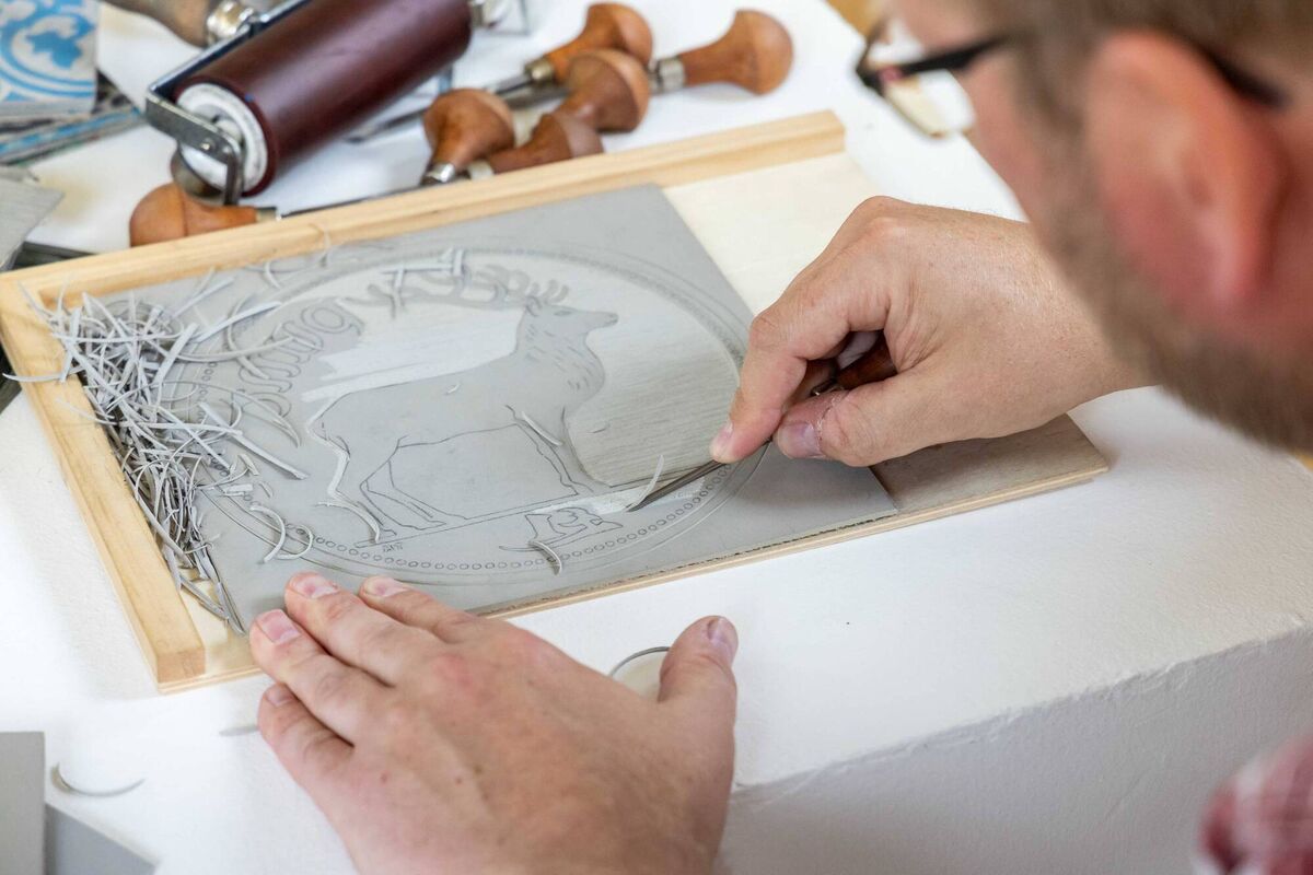  Cork Craft &amp; Design maker and lino-print artist John Bastow of Solas Agus Scáth, at work.