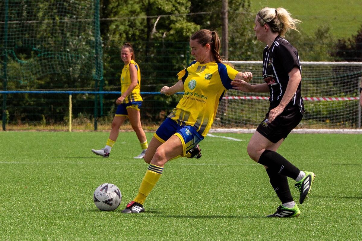 Clare Shine in action for Douglas Hall against Whitehall Rangers in the FAI Cup first round. Pic: Colm Ó Duibhir